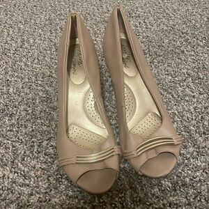 Worn shoes beige in color